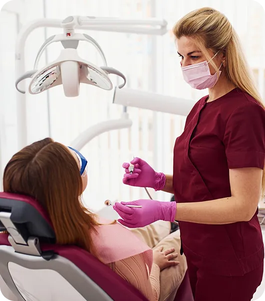 Dental specialist with patient