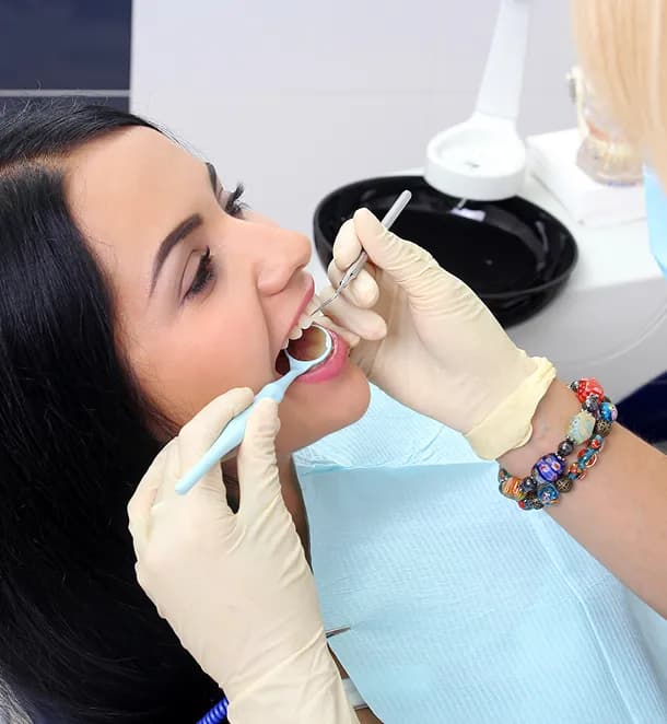 Patient in dental chair during teeth extraction consultation