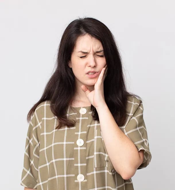 Magnum Dental Clinic patient experiencing relief from tooth pain