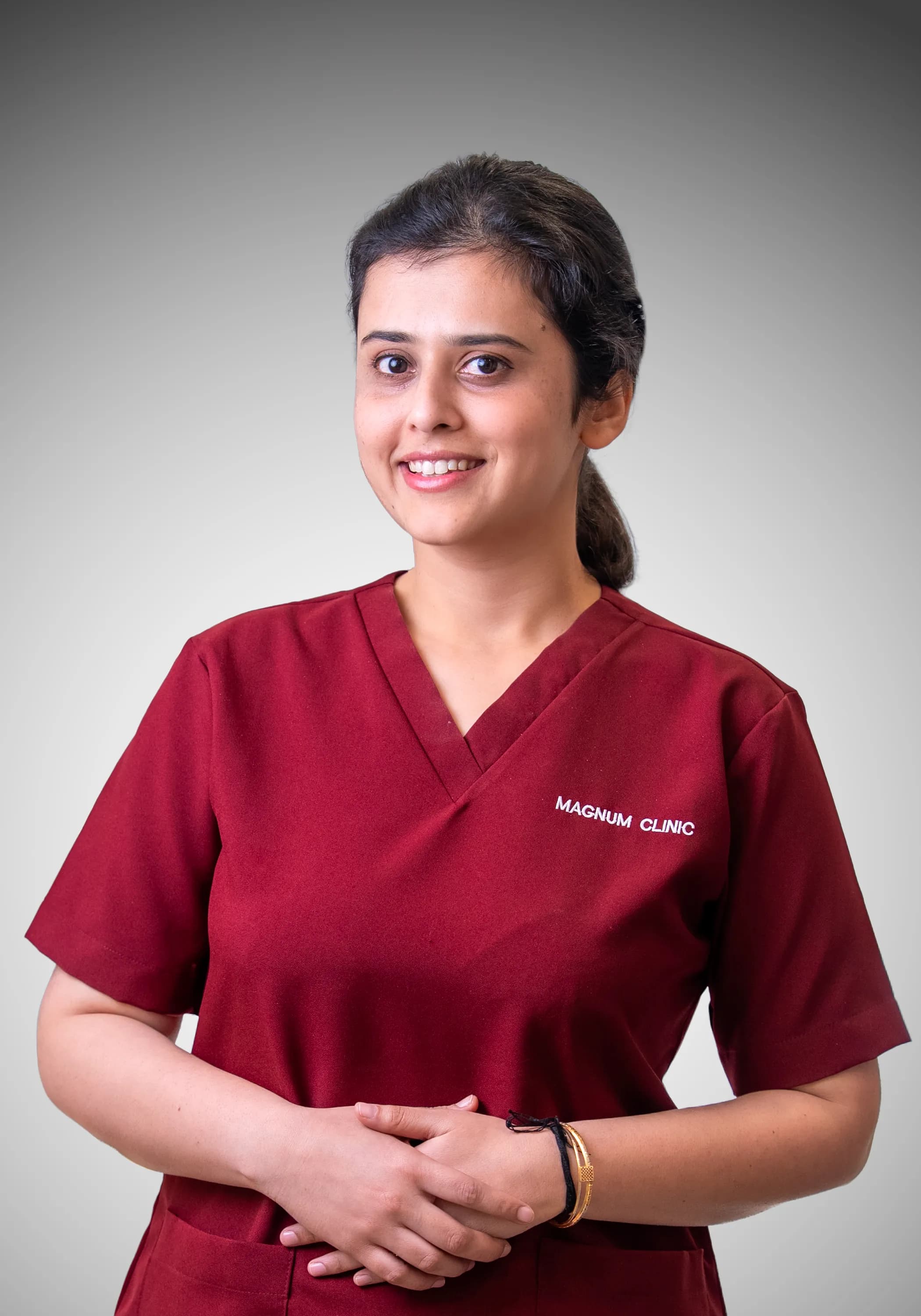 Dr. Prashansa Dixit providing specialist orthodontic care at Magnum Clinic