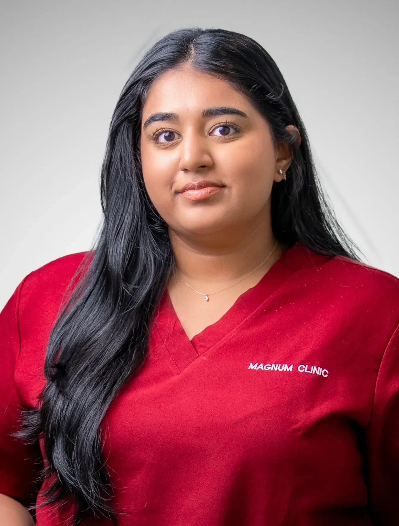 Dr. Sathvica Chaparala providing patient-centered dental care at Magnum Dental Clinic Dubai